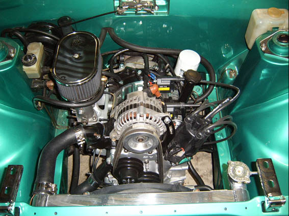 Restored engine bay with rotary engine